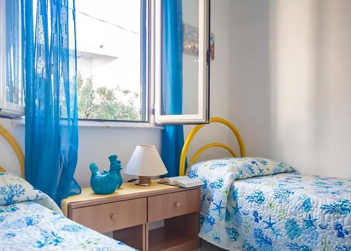 Апартаменты Lungomare Bay, E Sei In Spiaggia... Кала-Гононе